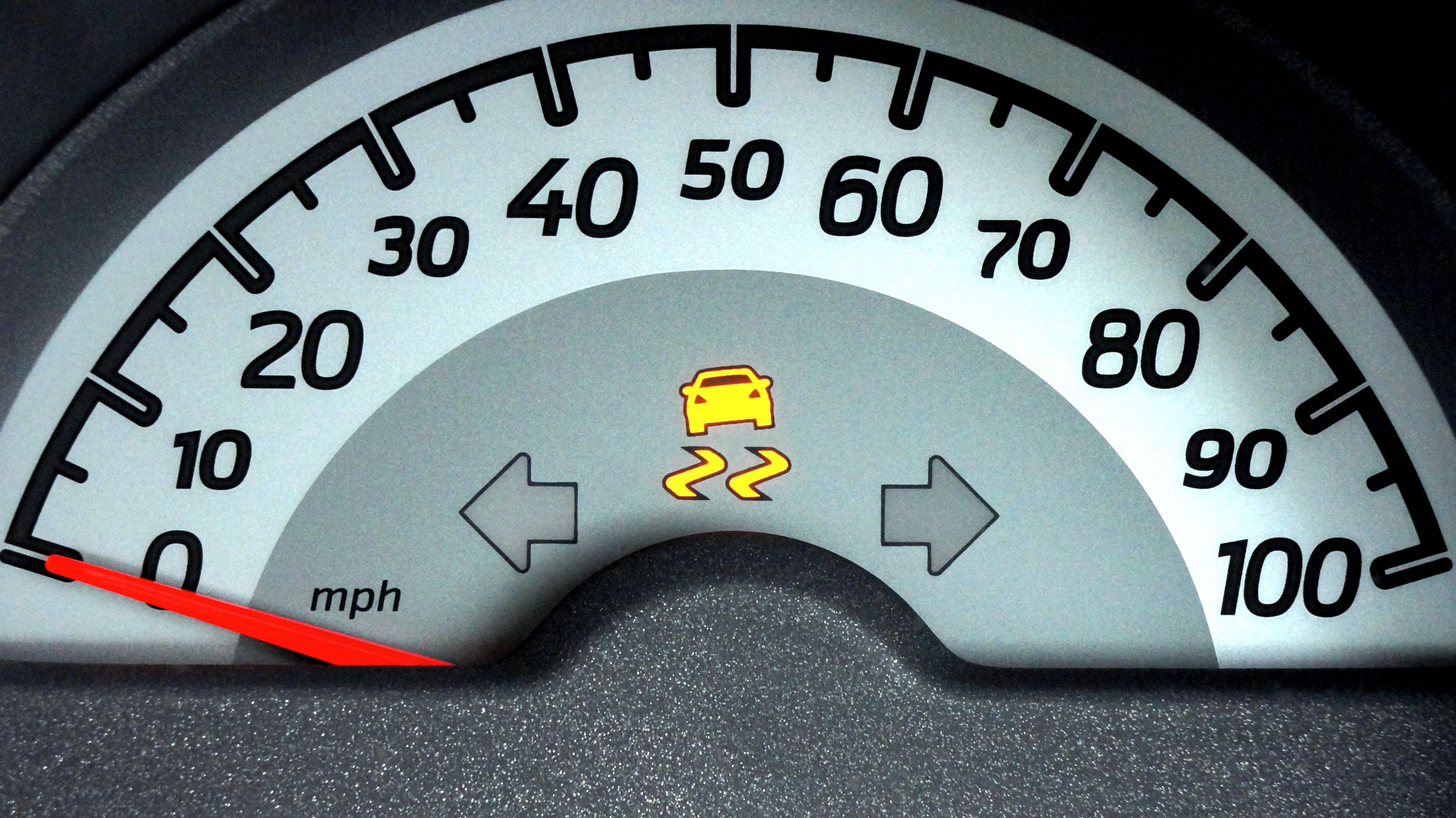 ABS warning light illuminated on a car dashboard