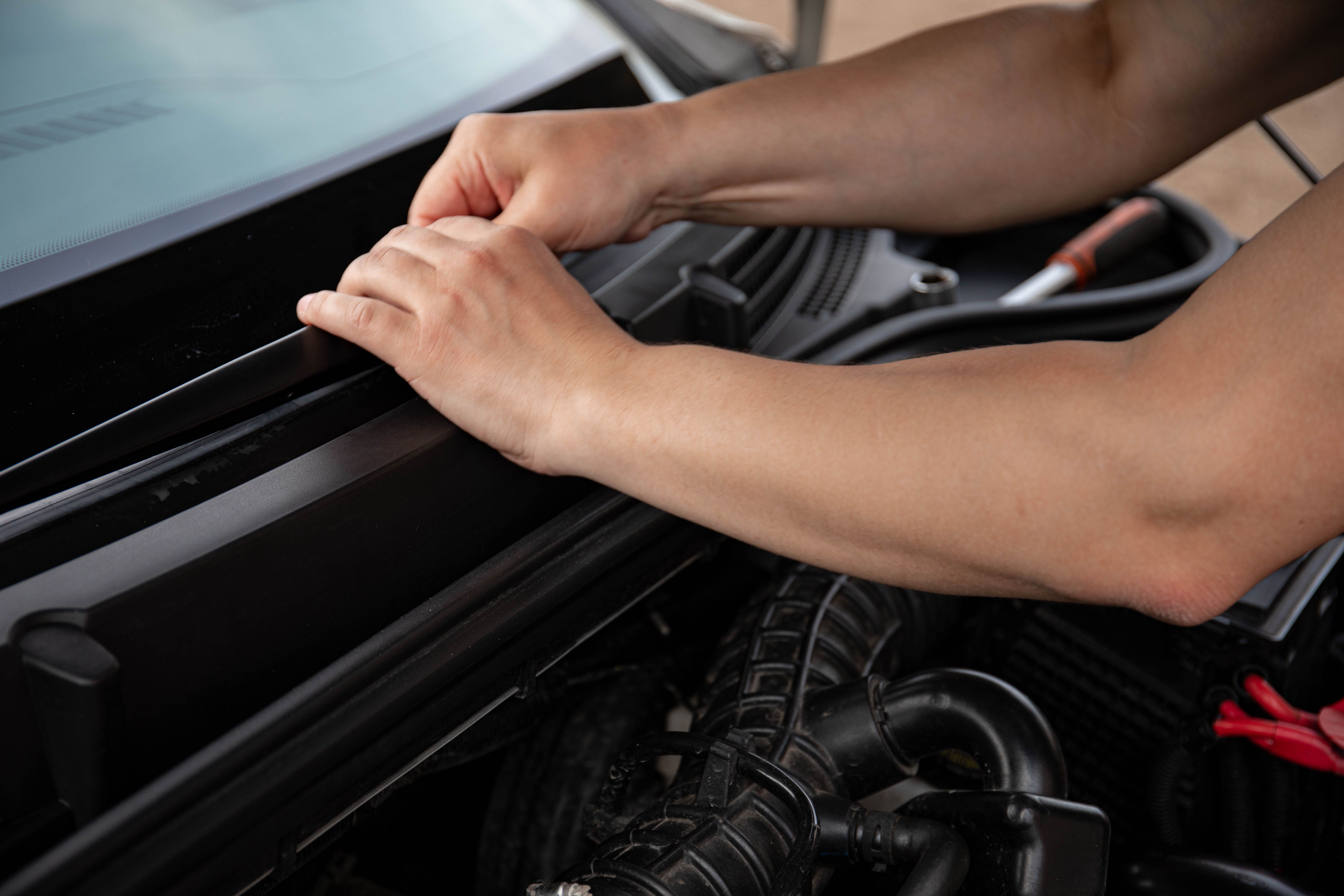 Replacing a windshield wiper blade on a car