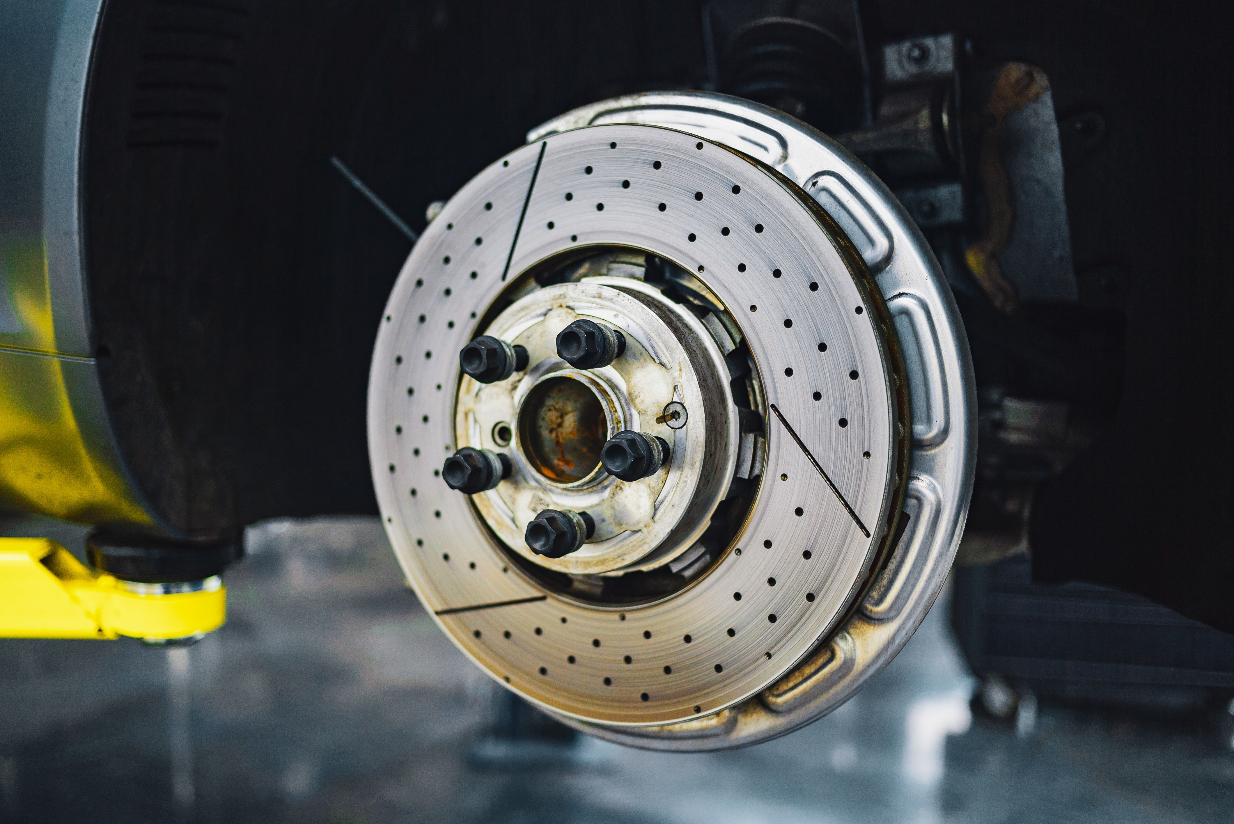 Car brake disc and caliper inspection
